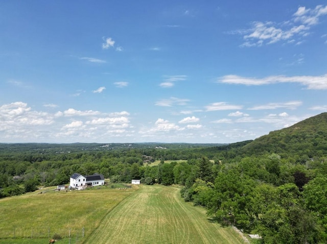 birds eye view of property featuring a rural view