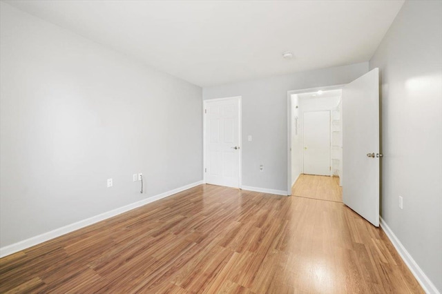 unfurnished bedroom featuring light hardwood / wood-style floors