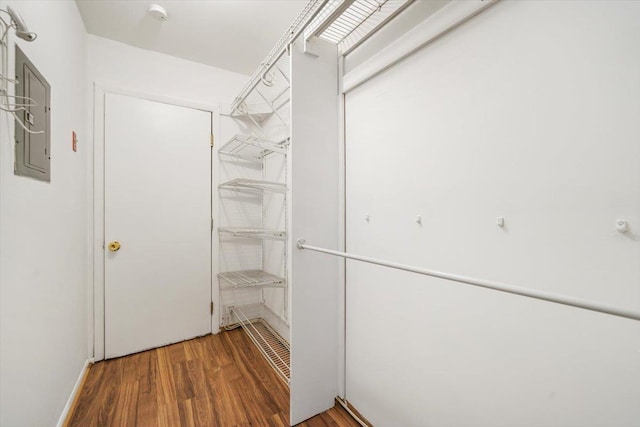 walk in closet featuring hardwood / wood-style floors