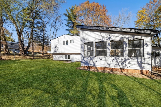 exterior space featuring a lawn