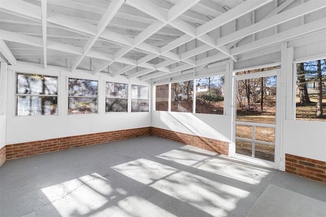 unfurnished sunroom featuring a healthy amount of sunlight