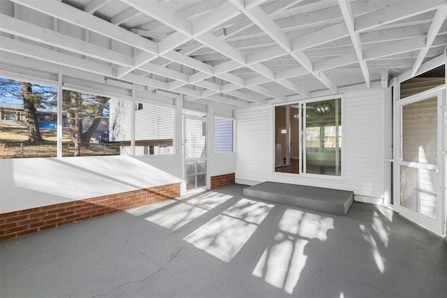 unfurnished sunroom featuring plenty of natural light