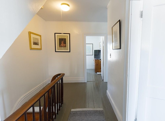 hall with dark hardwood / wood-style flooring