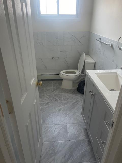 bathroom featuring toilet and a shower