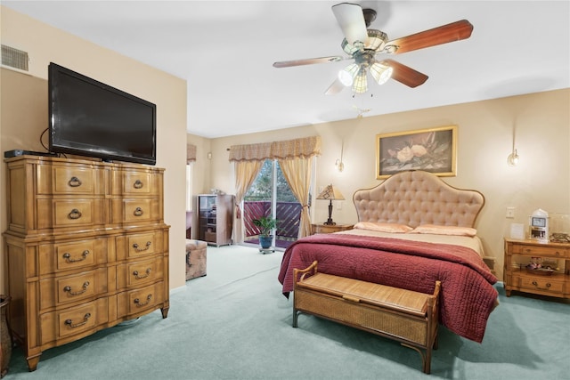 bedroom featuring access to exterior, carpet, and ceiling fan