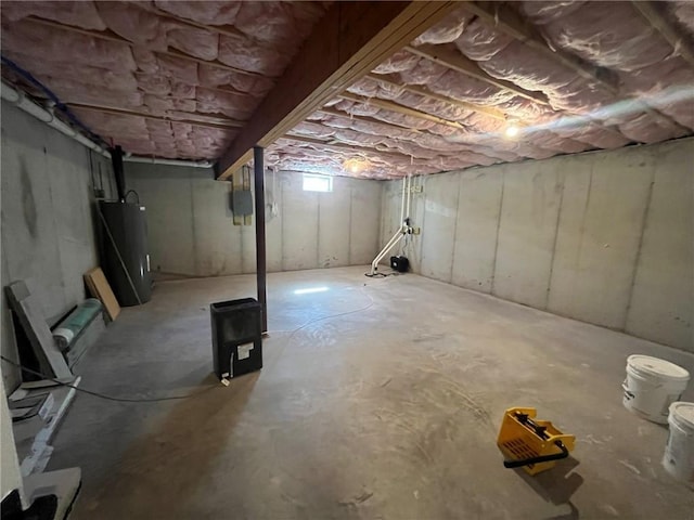 basement featuring water heater