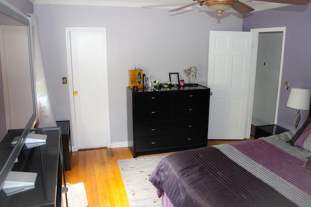 bedroom featuring ceiling fan and light wood-type flooring