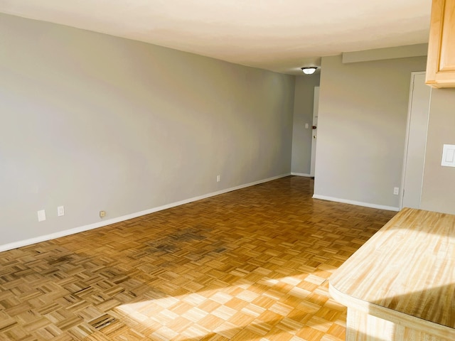 empty room featuring parquet floors