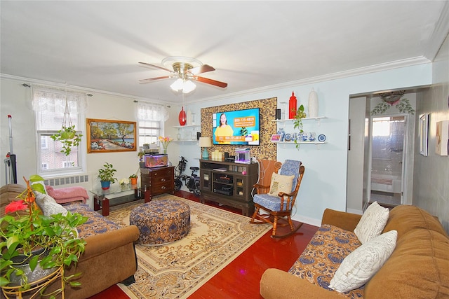 living room with ceiling fan, wood-type flooring, and crown molding