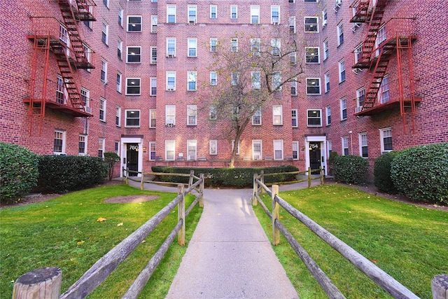 surrounding community featuring a yard