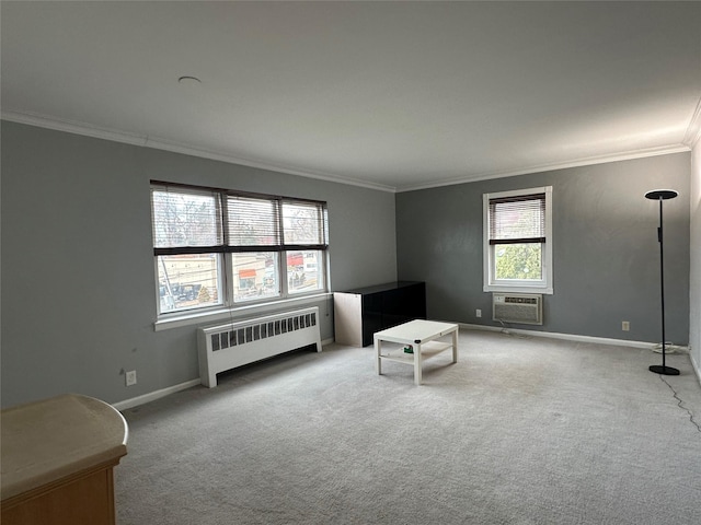 interior space with light carpet, radiator, crown molding, and an AC wall unit