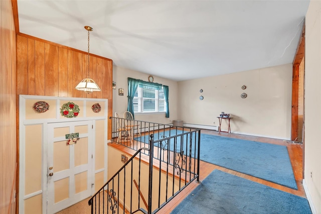 interior space featuring carpet floors and a baseboard radiator