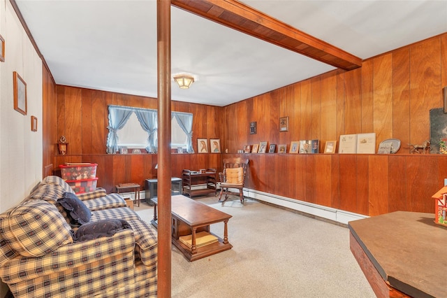 living room with wood walls, carpet floors, beam ceiling, and a baseboard radiator