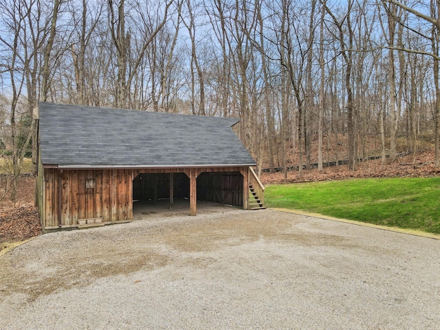 garage featuring a yard