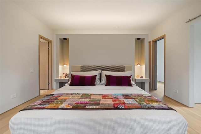 bedroom featuring light hardwood / wood-style floors