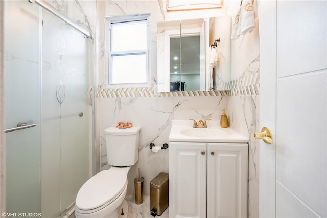 bathroom with vanity, tasteful backsplash, toilet, and a shower with shower door