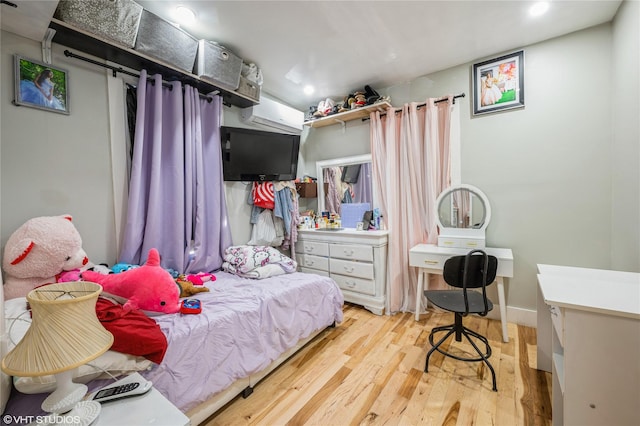 bedroom featuring light hardwood / wood-style floors