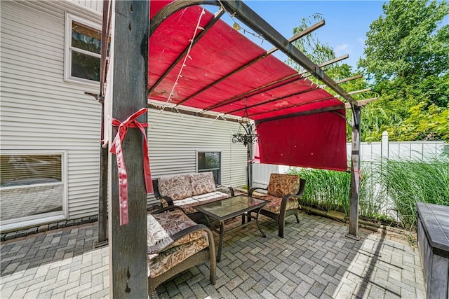 view of patio / terrace with an outdoor living space and a pergola