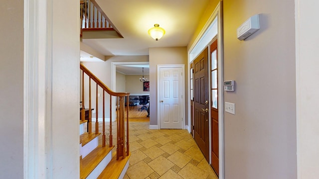 foyer entrance with light hardwood / wood-style flooring