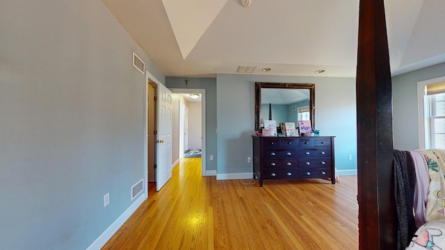 unfurnished bedroom featuring light wood-type flooring