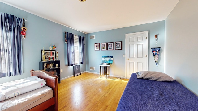 bedroom featuring hardwood / wood-style floors