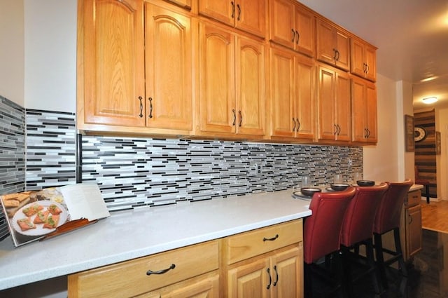 kitchen featuring backsplash