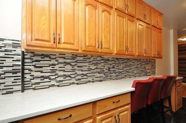 kitchen featuring tasteful backsplash