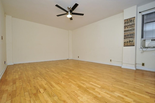 unfurnished room with ceiling fan and light wood-type flooring