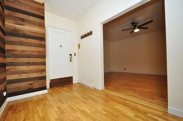 interior space featuring ceiling fan and light wood-type flooring