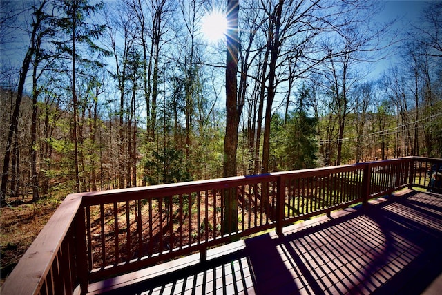 339 Mountain Lake Rd, Andes, NY 13731 - wooden deck with a wooded view