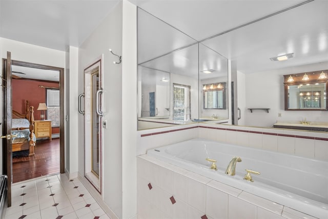 bathroom featuring ensuite bathroom, visible vents, tile patterned flooring, a stall shower, and a garden tub