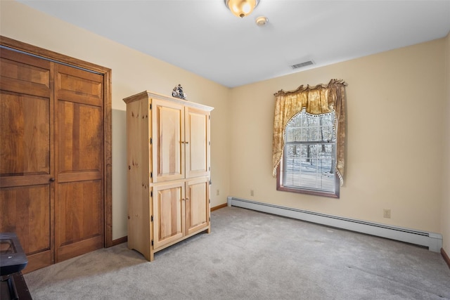 unfurnished bedroom featuring visible vents, a baseboard radiator, and light colored carpet