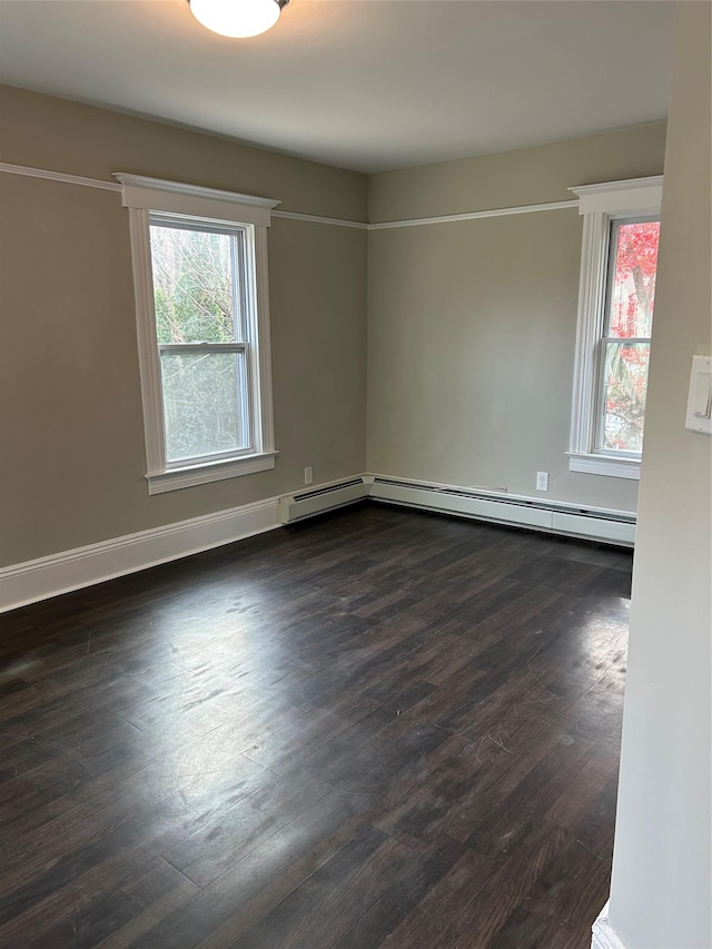 unfurnished room with hardwood / wood-style flooring