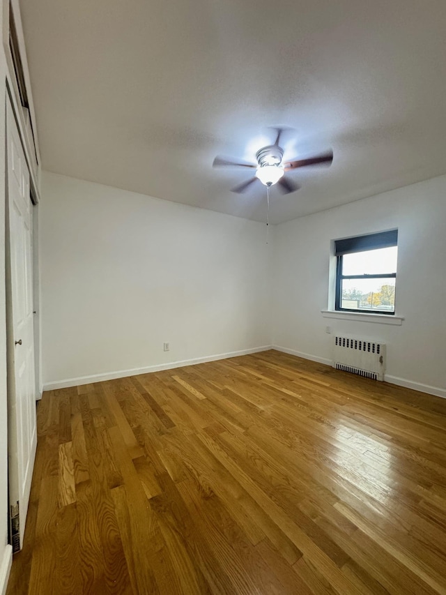 spare room with wooden walls