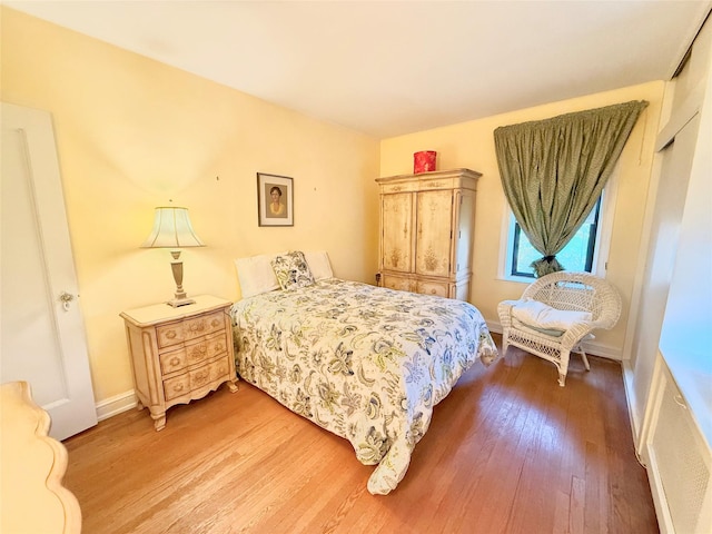 bedroom featuring hardwood / wood-style flooring