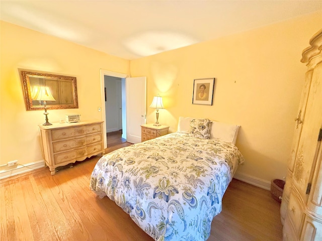 bedroom featuring light hardwood / wood-style floors