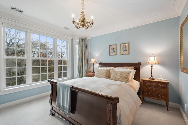 bedroom featuring light carpet, ornamental molding, and a notable chandelier