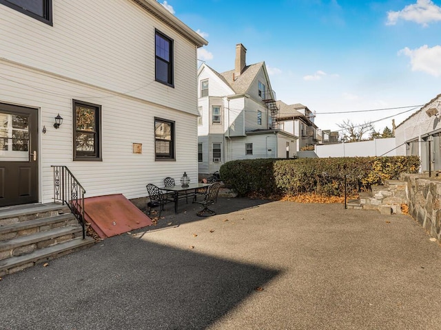 rear view of house featuring a patio area