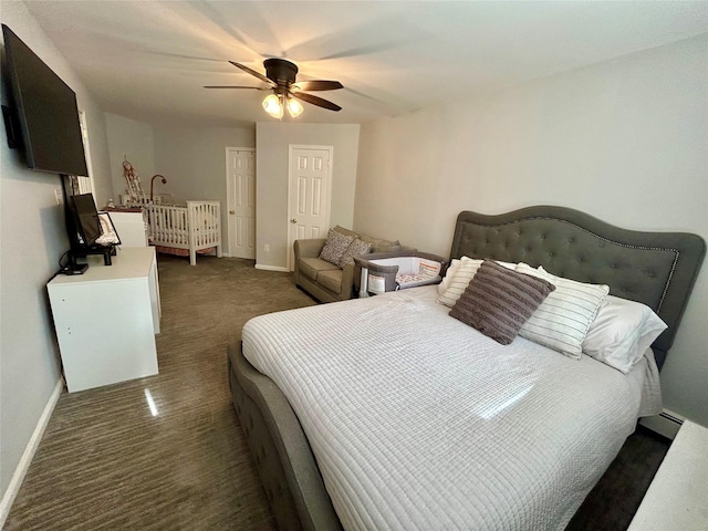 bedroom featuring ceiling fan and dark carpet