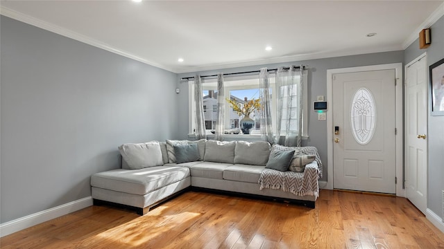 3207 Ampere Ave, Bronx, NY 10465 - living room featuring light wood-style flooring, crown molding, baseboards, and recessed lighting