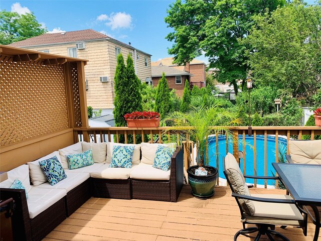 3207 Ampere Ave, Bronx, NY 10465 - deck featuring an outdoor living space and an outdoor pool