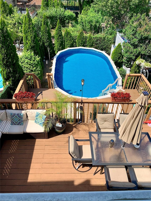 view of pool featuring a deck