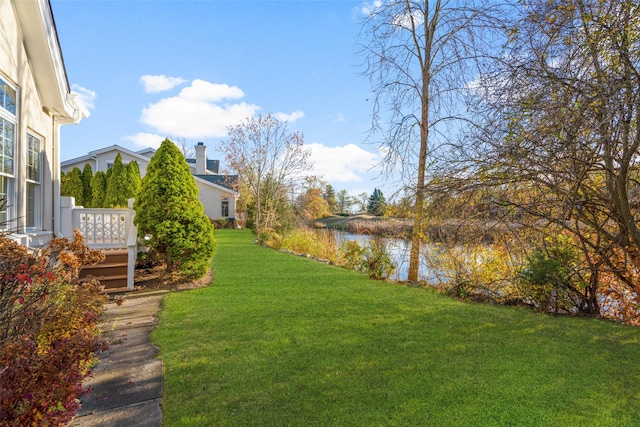 view of yard with a water view