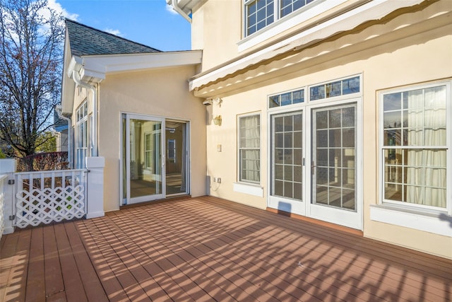 wooden deck featuring french doors