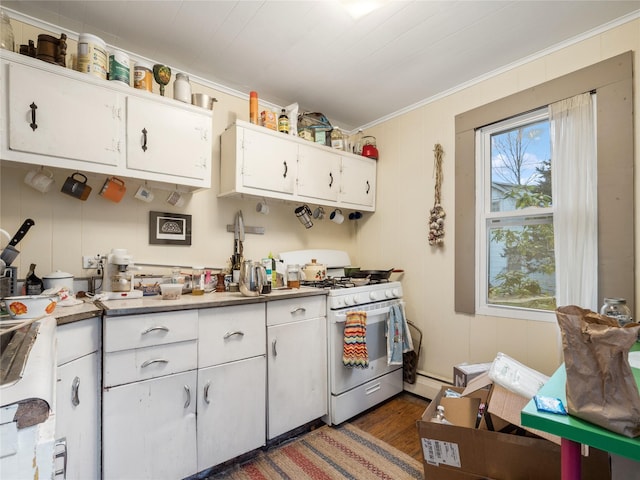 kitchen with ornamental molding, white cabinetry, white range with gas cooktop, and dark wood-type flooring