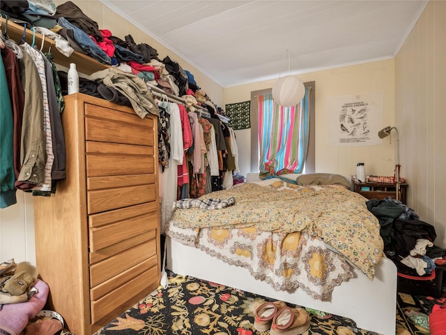 bedroom featuring crown molding