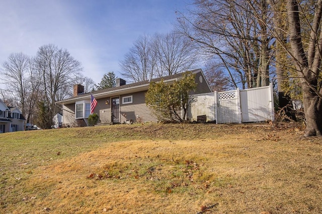 view of front of home with a front yard