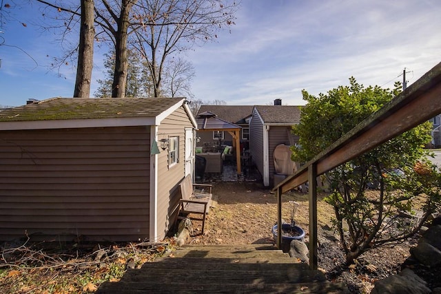 exterior space featuring a storage shed