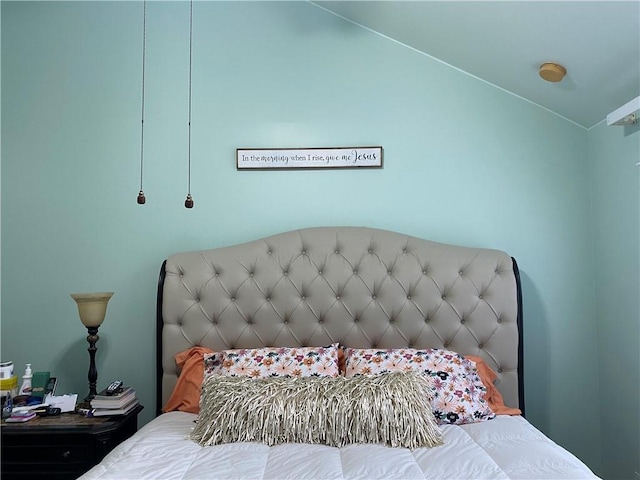 bedroom featuring lofted ceiling