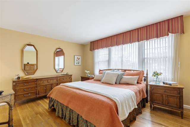 bedroom featuring wood finished floors